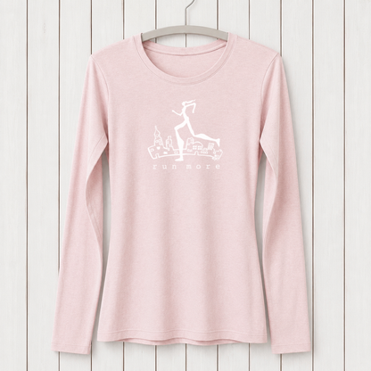 Light pink women's long sleeve T-shirt made from bamboo and organic cotton with a white graphic of a running woman and cityscape, perfect for activewear and running fitness.