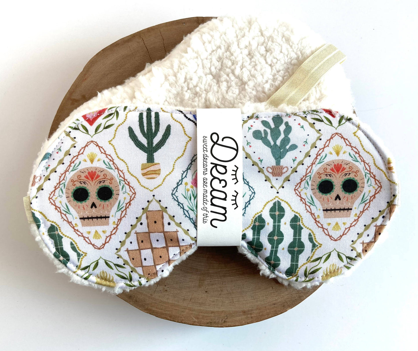 Sweet Dreams Sleep Mask - Frida White Print featuring colorful sugar skulls and cacti on soft cotton with plush minky backing, ideal for restful sleep.