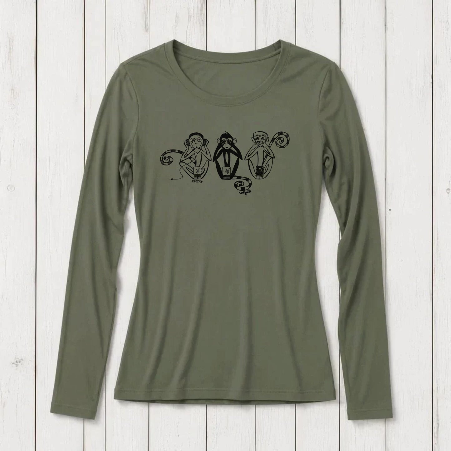 Olive green long sleeve women's T-shirt with black graphic of three wise monkeys covering eyes, ears, and mouth, made from bamboo and organic cotton.