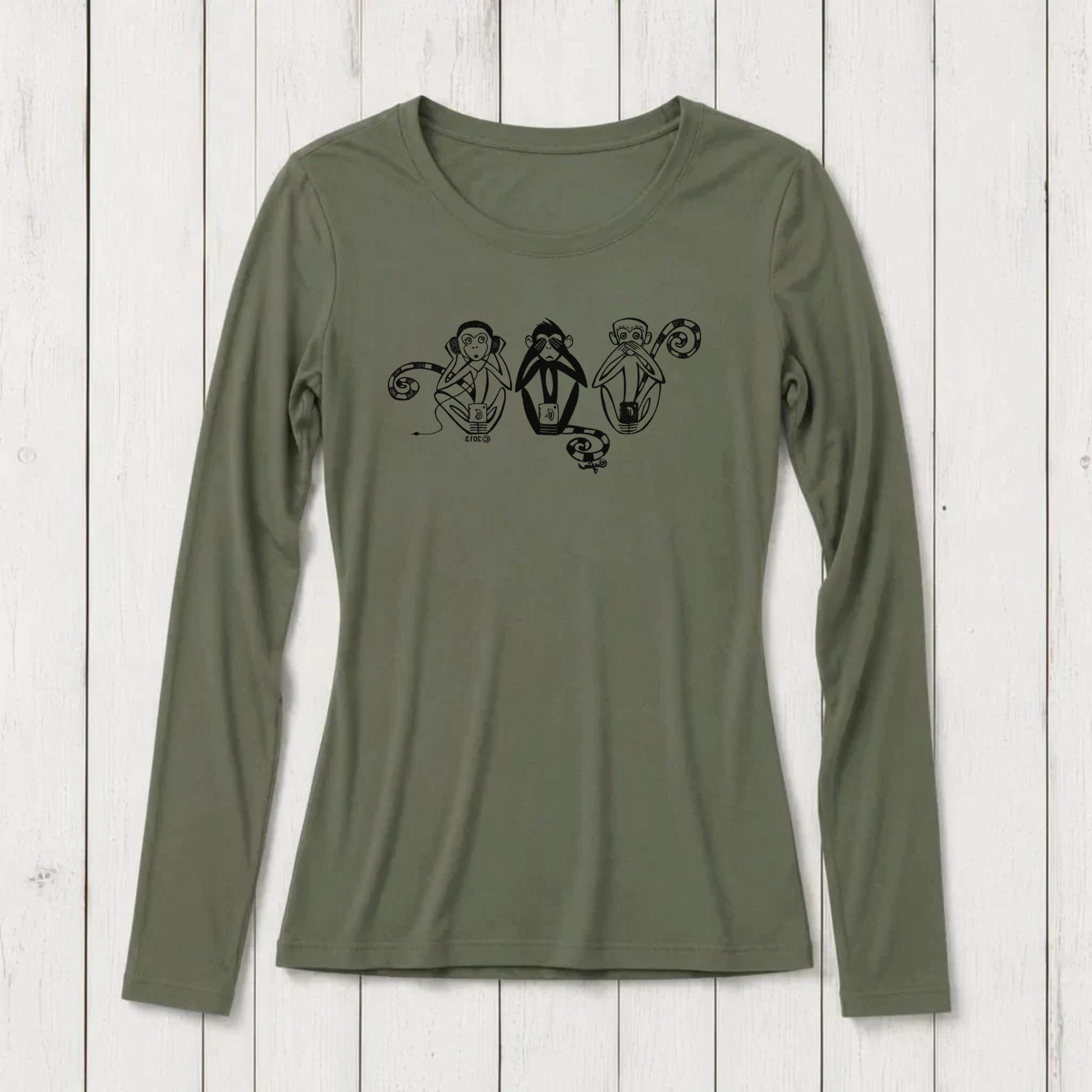 Olive green long sleeve women's T-shirt with black graphic of three wise monkeys covering eyes, ears, and mouth, made from bamboo and organic cotton.