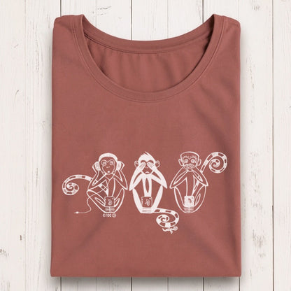 Rust-colored women's long sleeve T-shirt with white graphic of three wise monkeys covering ears, eyes, and mouth, made from bamboo organic cotton.