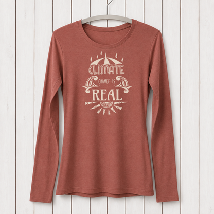 Rust-colored women's long sleeve T-shirt with eco-friendly bamboo and organic cotton material, featuring a climate change awareness graphic design, hanging on a white wooden background - SKU: WLSXSNAV