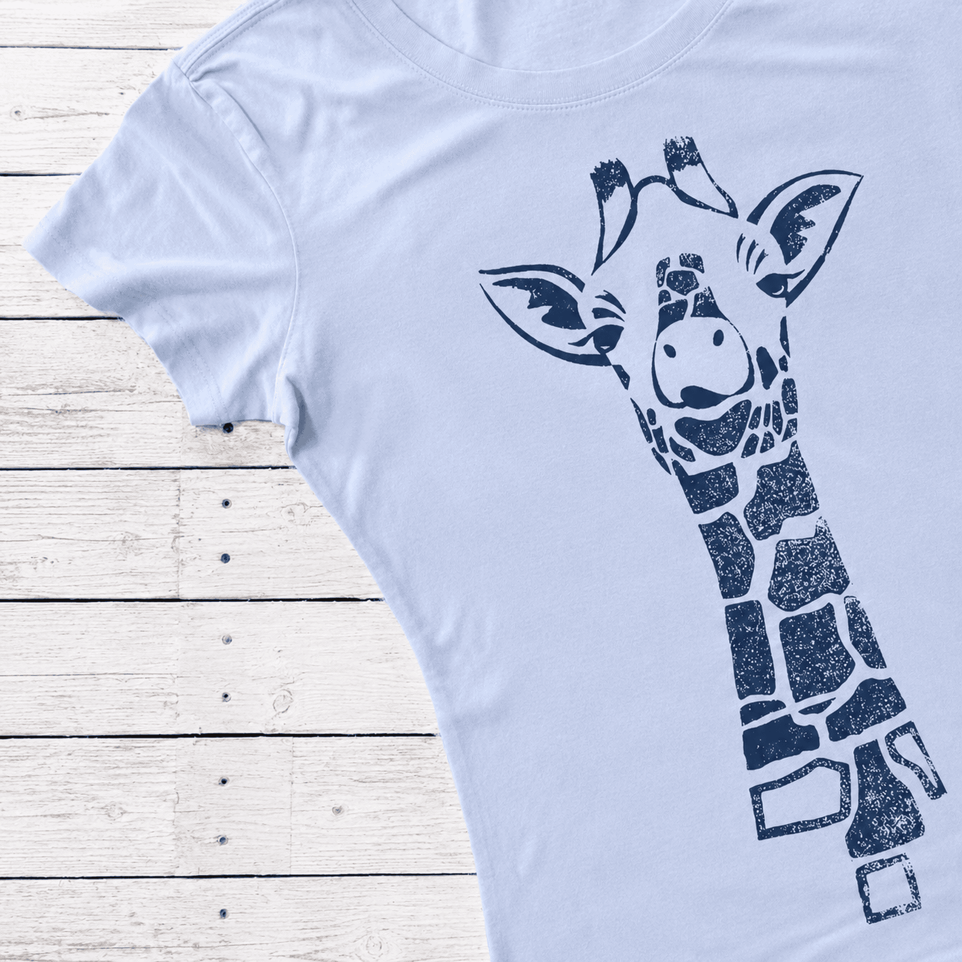 Light blue women's T-shirt with a navy blue giraffe graphic design made from sustainable bamboo and organic cotton, casual style