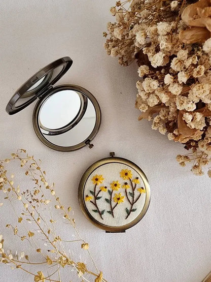 Floral Compact Mirror featuring yellow flower embroidery, part of Sophia Collection, ideal for gifting and everyday beauty use.