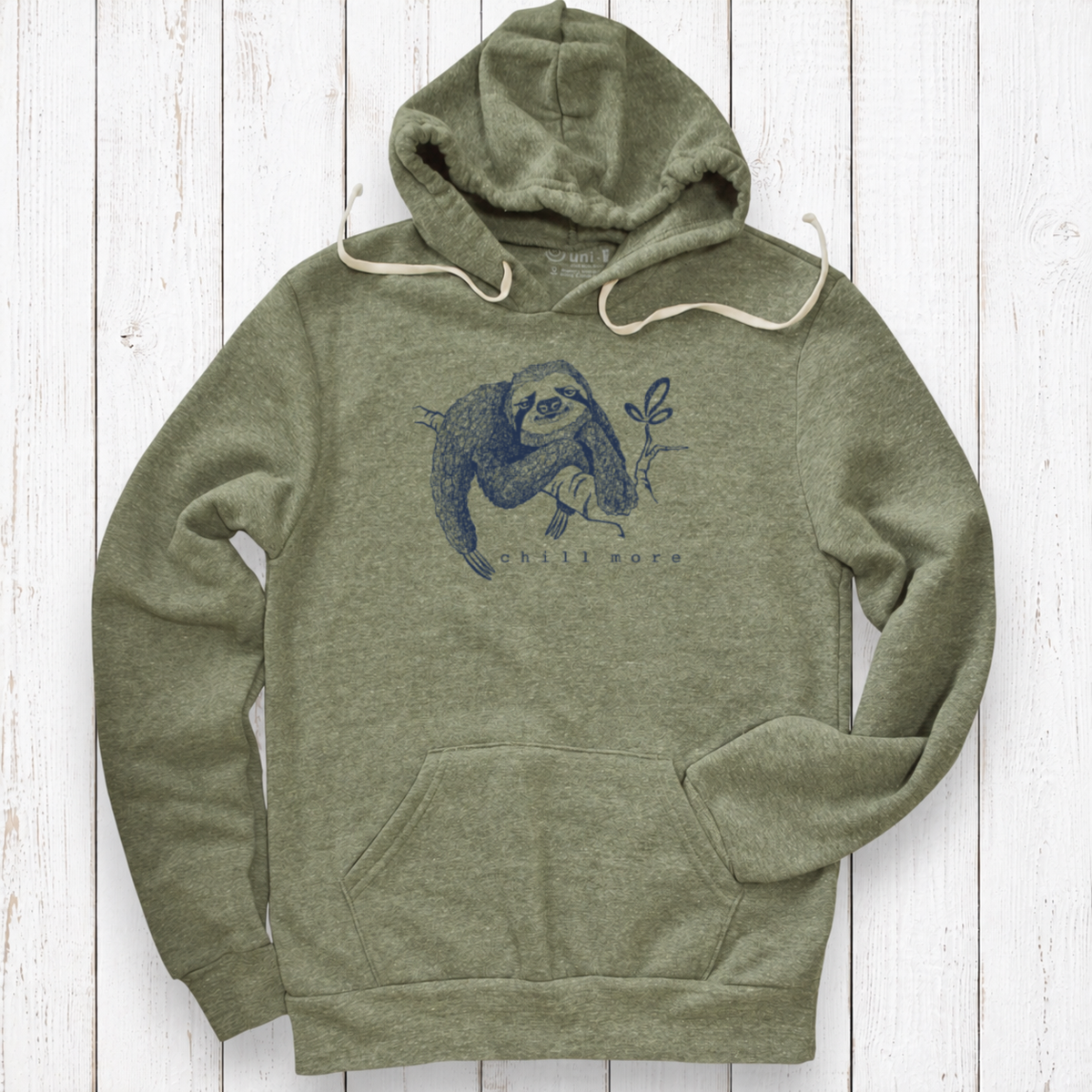 Heather olive hoodie on white wood.png