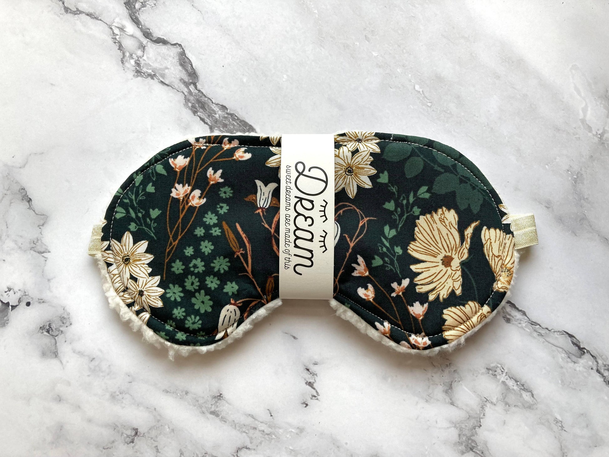 Floral-patterned Emerald Sleep Mask made of 100% cotton with plush minky lining, ideal for sweet dreams and gentle on skin.