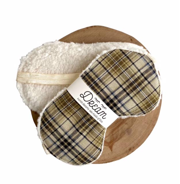 Plaid Sleep Mask - Cotton Sleep Mask for Relaxation with soft sherpa lining and elastic strap, displayed on a wooden tray.