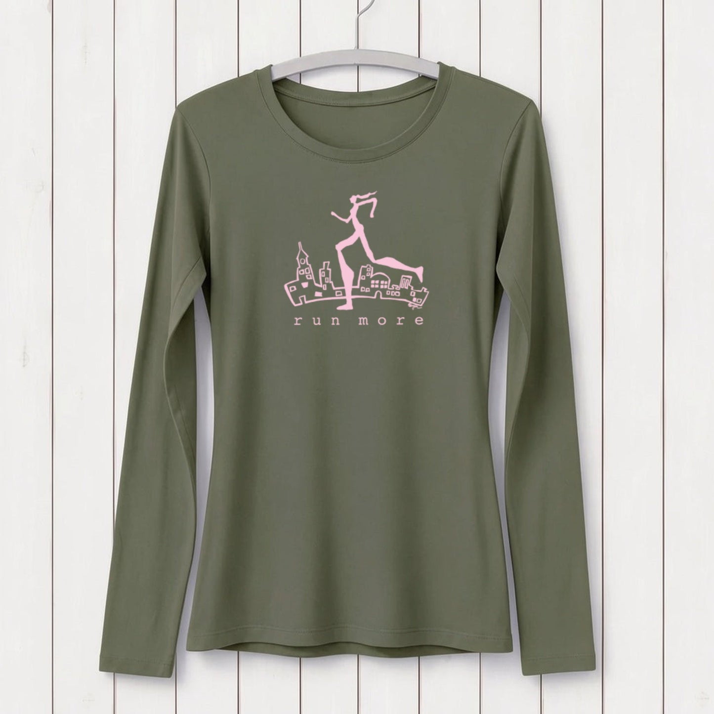 Olive green women's long sleeve T-shirt with pink graphic of a runner and cityscape, made from bamboo and organic cotton, casual activewear