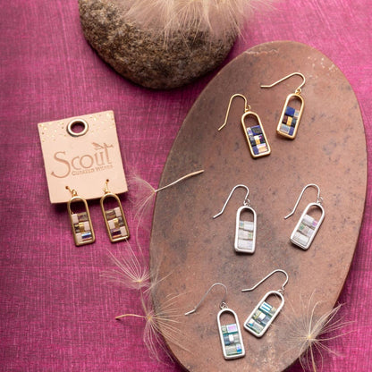 Assorted Miyuki Frame Earrings including Indigo/Gold style, arranged on a decorative surface for a colorful jewelry collection display.