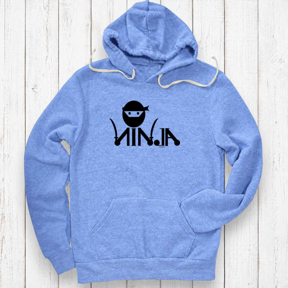 Light periwinkle hoodie on white wood.png