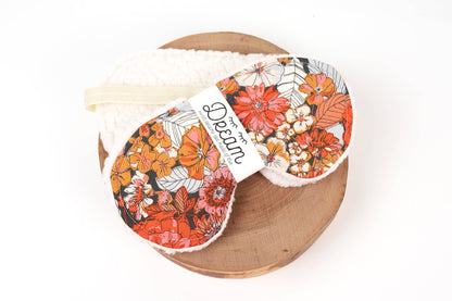 Sweet Dreams Sleep Mask by Little Man with floral cotton front and soft minky back, displayed on a wooden tray for home relaxation use.