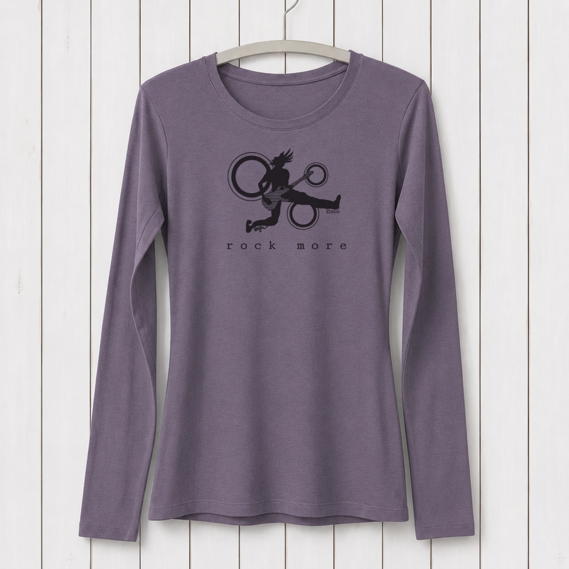 Purple long sleeve graphic T-shirt featuring a silhouette of a guitarist jumping with a guitar, eco-friendly casual wear for music lovers, size L