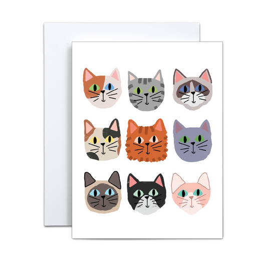 The Copper & Print Cat Greeting Card Handmade - Just Because Cats features nine uniquely illustrated cat faces on a white background—a charming handmade card for any occasion.