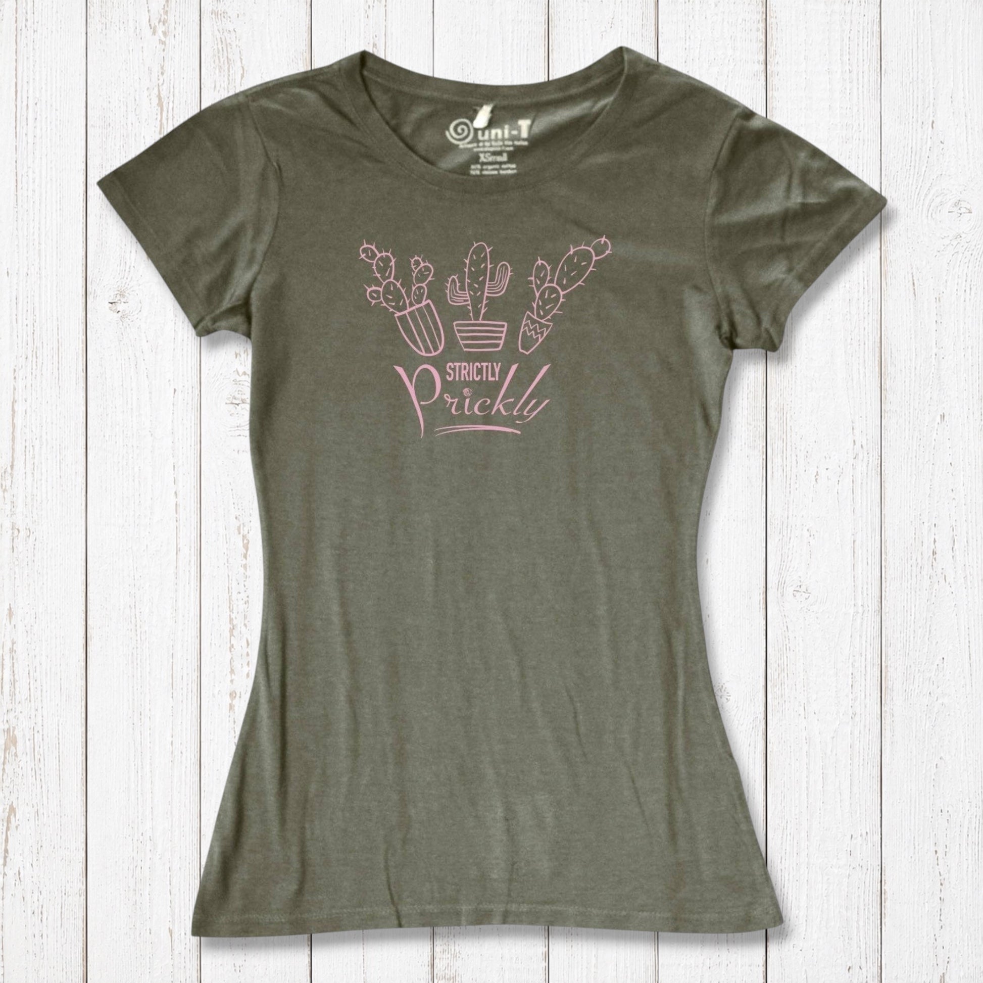 Olive green cactus t-shirt for women with pink 'Strictly Prickly' print. Sustainable bamboo and organic cotton for eco-conscious fashion.