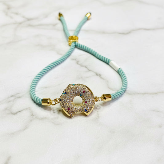 Blue cord bracelet with infinity charm