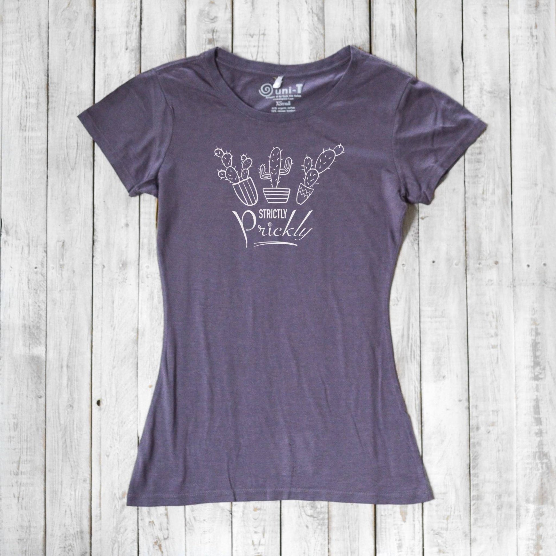 Purple cactus t-shirt for women with white 'Strictly Prickly' print. Sustainable bamboo and organic cotton fabric for stylish eco wear.