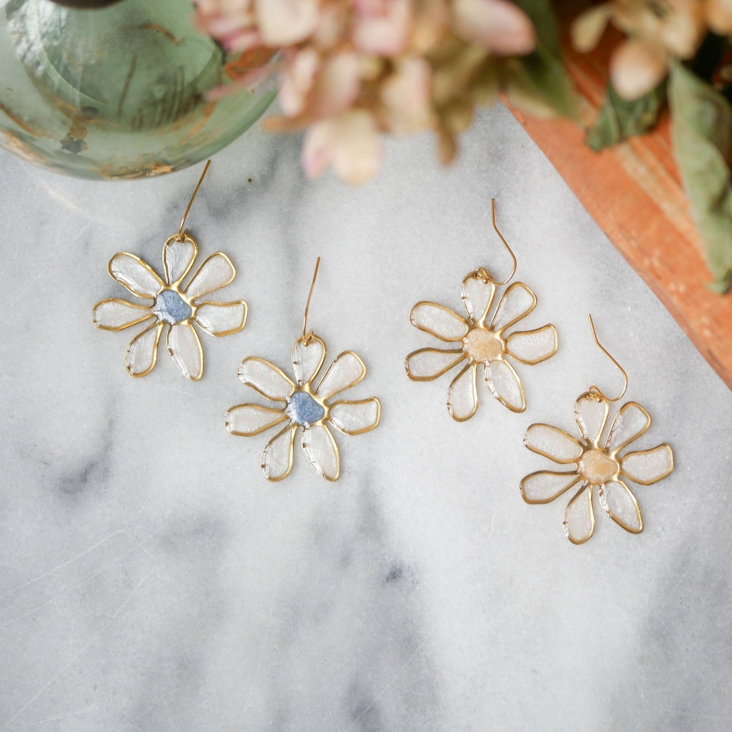 Daisy stained glass earrings with gold outlines and pastel centers, ideal summer jewelry from Seed&SoilShop. Shop now for limited stock.