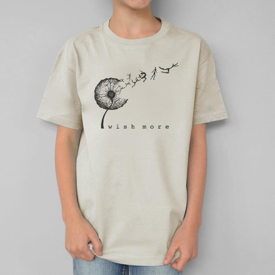 Uni-T organic cotton kids t-shirt in beige featuring a hand-illustrated black dandelion graphic with wish more text