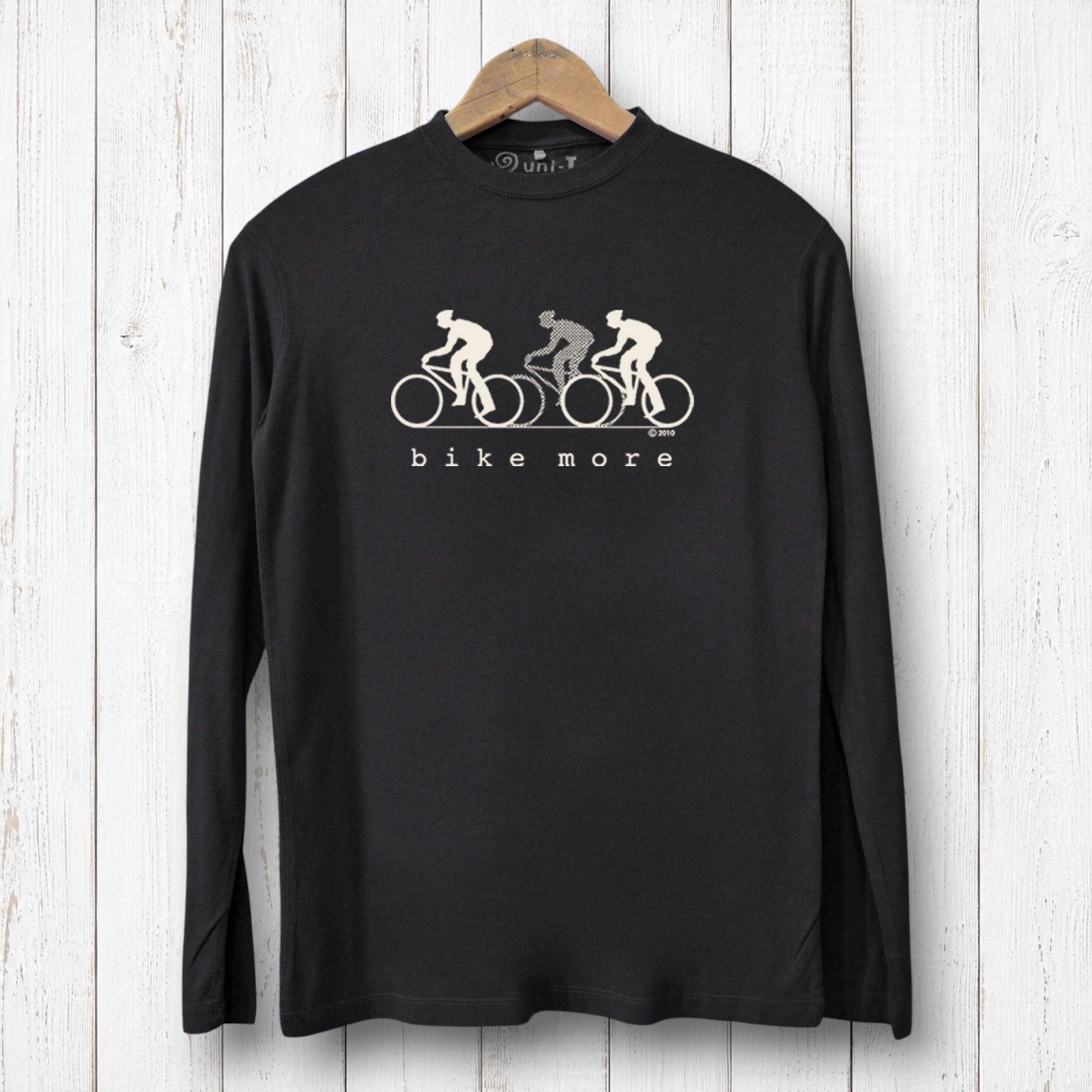 Uni-T black bamboo long sleeve shirt with white Bike More graphic print featuring three cyclists on a wooden hanger.