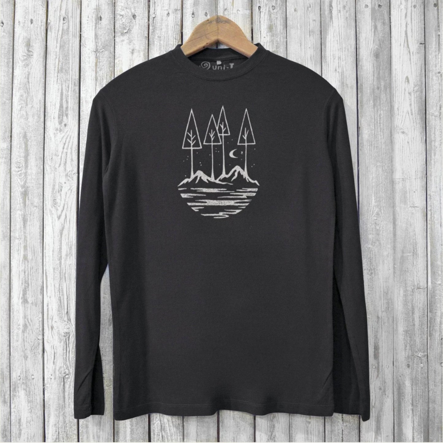 Uni-T black long sleeve bamboo t-shirt featuring a white hand-printed nature illustration of trees and mountains.