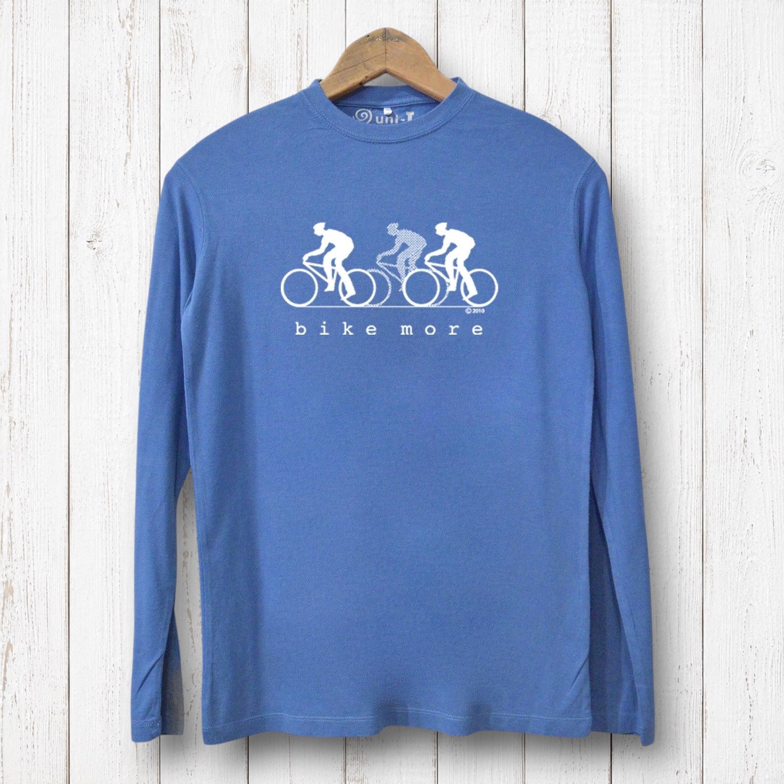Uni-T blue long sleeve bamboo and organic cotton t-shirt with white Bike More cycling graphic on a wooden background