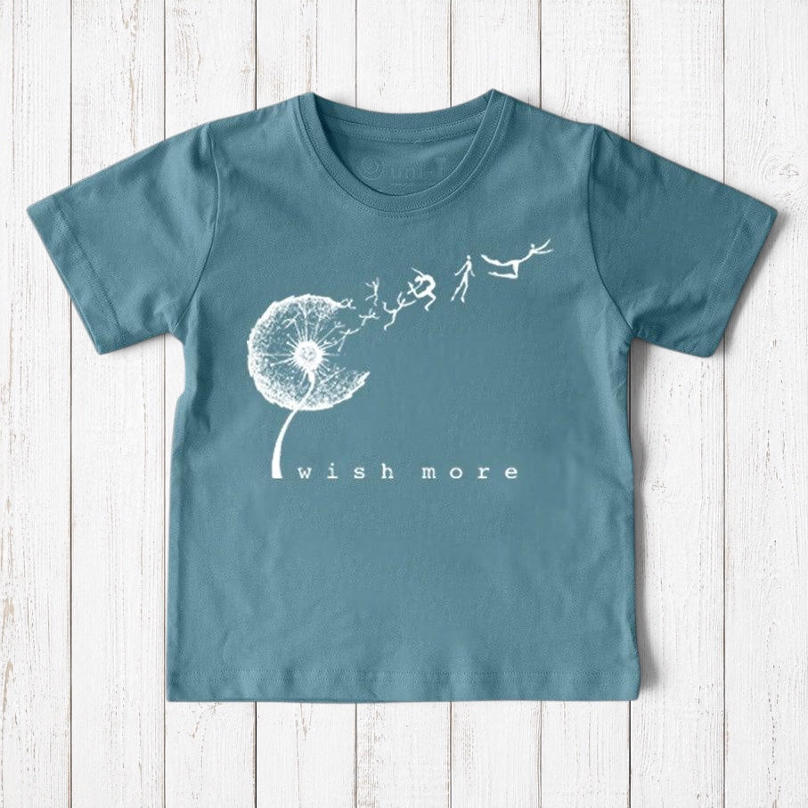 Uni-T organic cotton kids t-shirt in blue with a white hand-illustrated dandelion graphic and Wish More text.