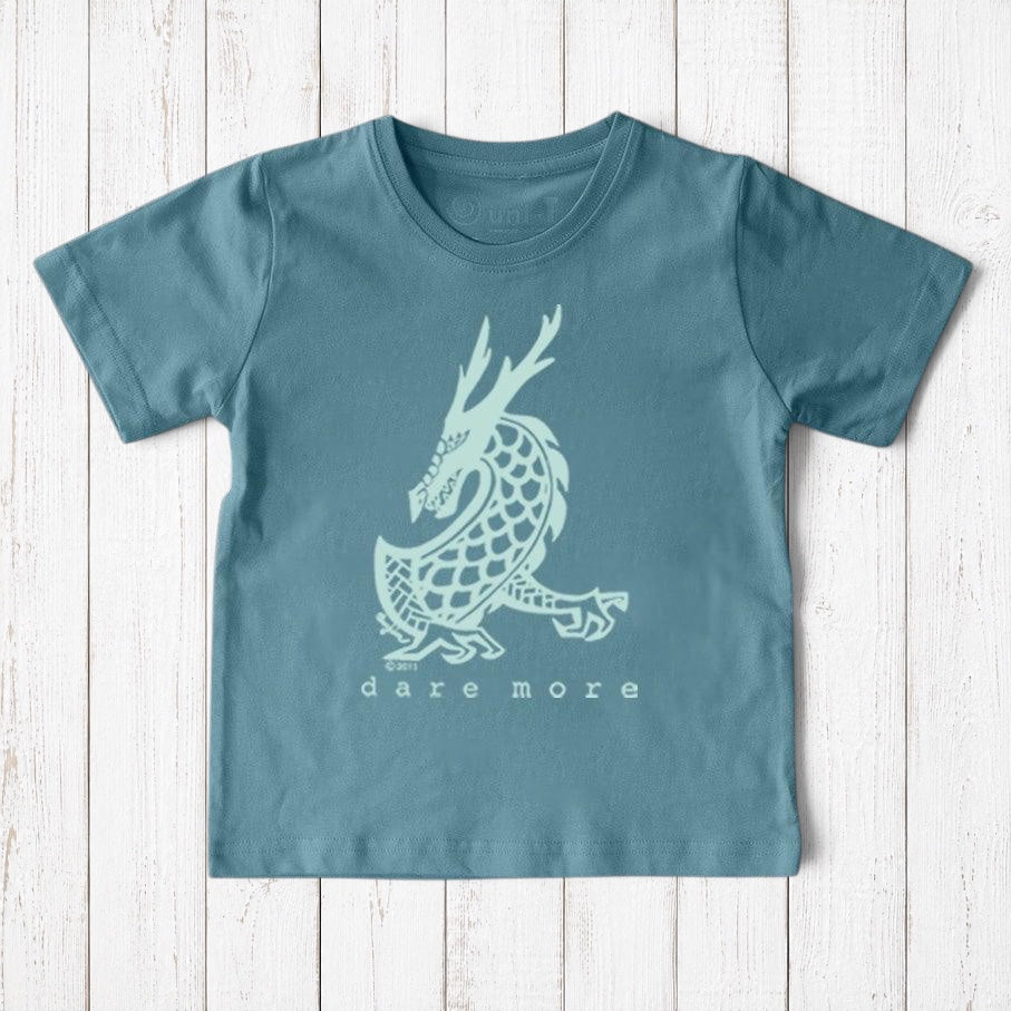 Uni-T kids organic cotton t-shirt in blue featuring a hand-illustrated white dragon graphic and Dare More text