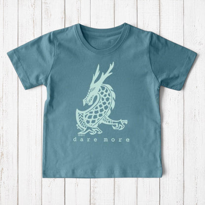 Uni-T kids organic cotton t-shirt in blue featuring a hand-illustrated white dragon graphic and Dare More text