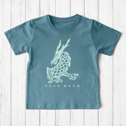 Uni-T kids organic cotton t-shirt in blue featuring a hand-illustrated white dragon graphic and Dare More text