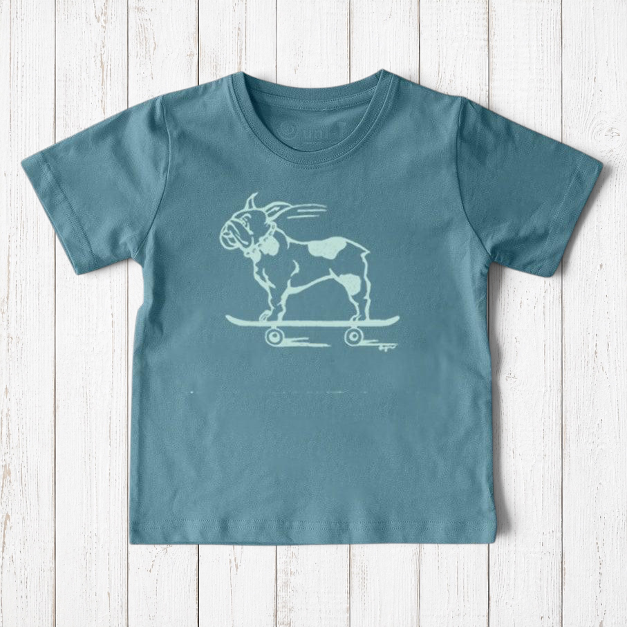 Uni-T kids organic cotton t-shirt in blue featuring a hand-illustrated French Bulldog riding a skateboard graphic