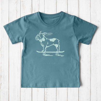 Uni-T kids organic cotton t-shirt in blue featuring a hand-illustrated French Bulldog riding a skateboard graphic
