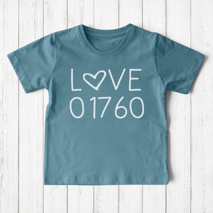 Uni-T kids blue organic cotton t-shirt featuring a white hand-drawn Love 01760 graphic for Natick pride