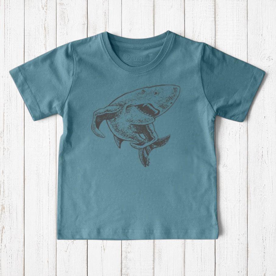 Uni-T kids organic cotton shark graphic t-shirt in blue with a hand-illustrated dark grey shark design