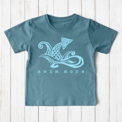 Uni-T kids organic cotton t-shirt in blue with a hand-illustrated fish graphic and Swim More text