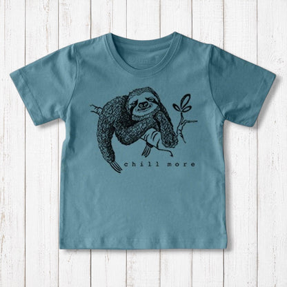 Uni-T kids' blue organic cotton t-shirt featuring a hand-illustrated black sloth graphic with the text Chill More