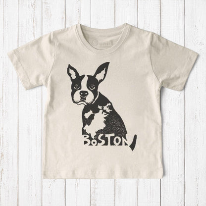 Uni-T kids organic cotton t-shirt in beige featuring a hand-illustrated black Boston Terrier graphic