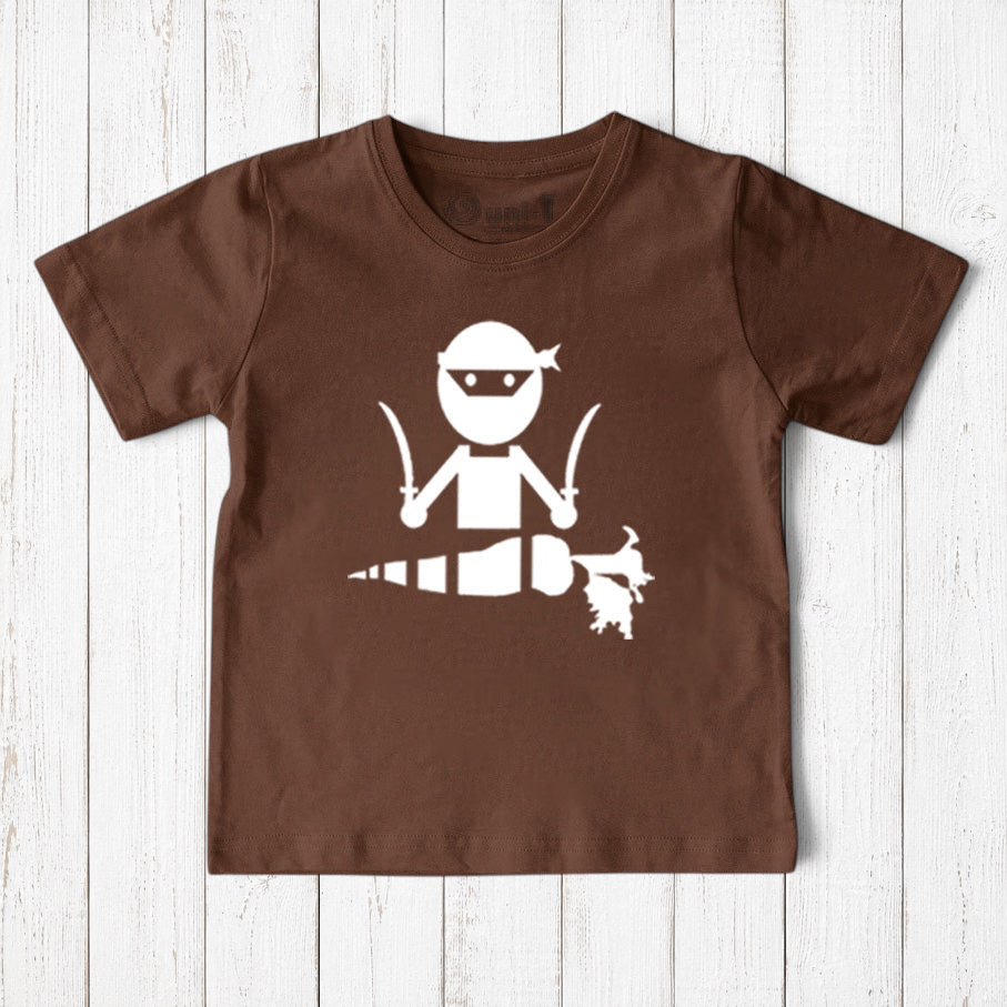 Uni-T kids brown organic cotton t-shirt featuring a white hand-illustrated ninja graphic chopping a carrot