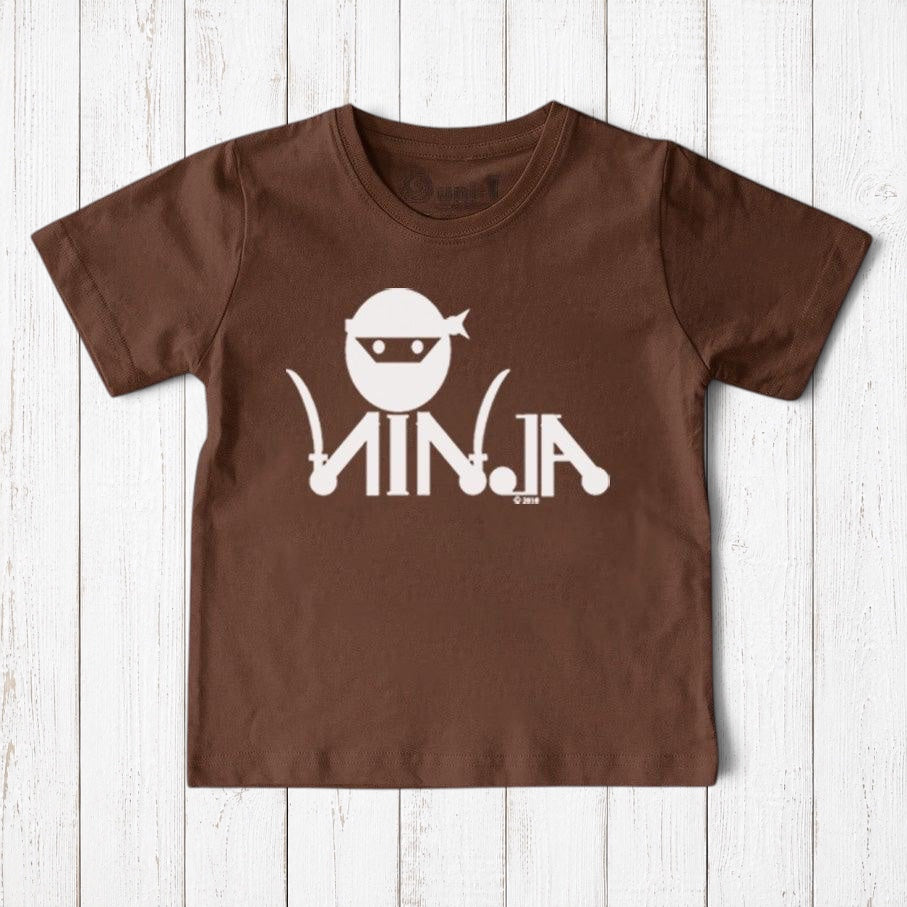 Uni-T brown organic cotton kids t-shirt featuring a white ninja graphic and text on a rustic wooden background