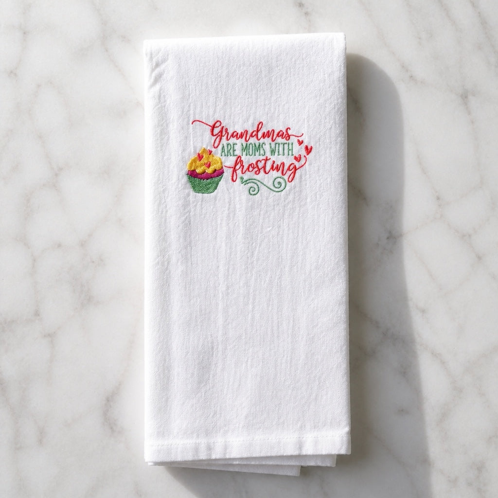 Uni-T white flour sack kitchen towel with Grandmas are moms with frosting embroidery and a cupcake design