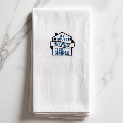 Uni-T white kitchen towel featuring blue and black embroidered house design with the text My house, my rules