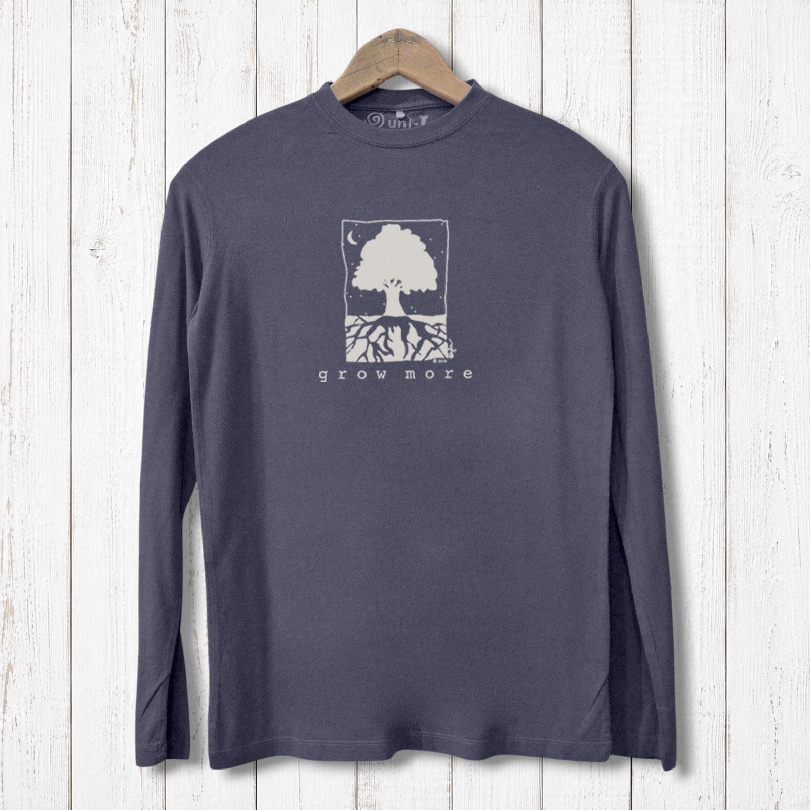 Uni-T men's long sleeve t-shirt in charcoal grey featuring a white Grow More tree graphic on a rustic wood background.