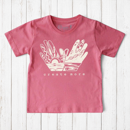 Uni-T kids organic cotton t-shirt in dusty pink with a white hand-drawn Create More graphic illustration