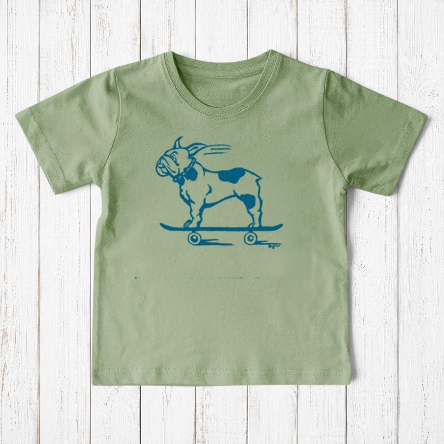 Uni-T kids organic cotton sage green t-shirt featuring a hand-illustrated blue French Bulldog riding a skateboard