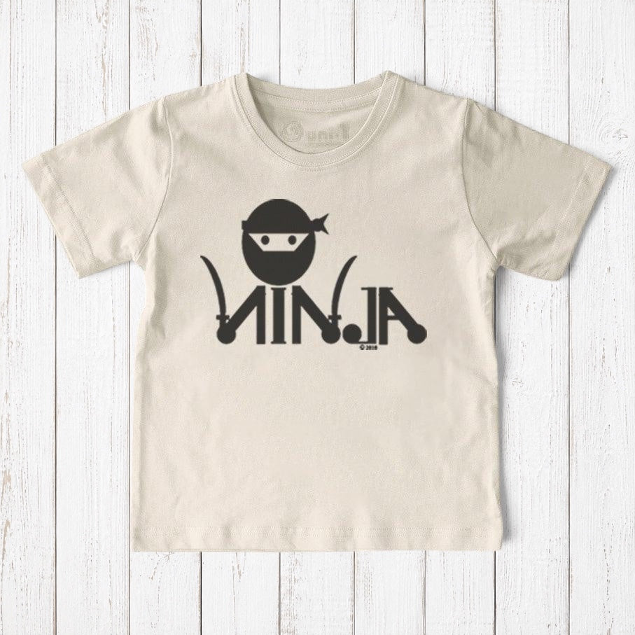 Uni-T kids organic cotton t-shirt in cream featuring a black ninja graphic for active play and martial arts