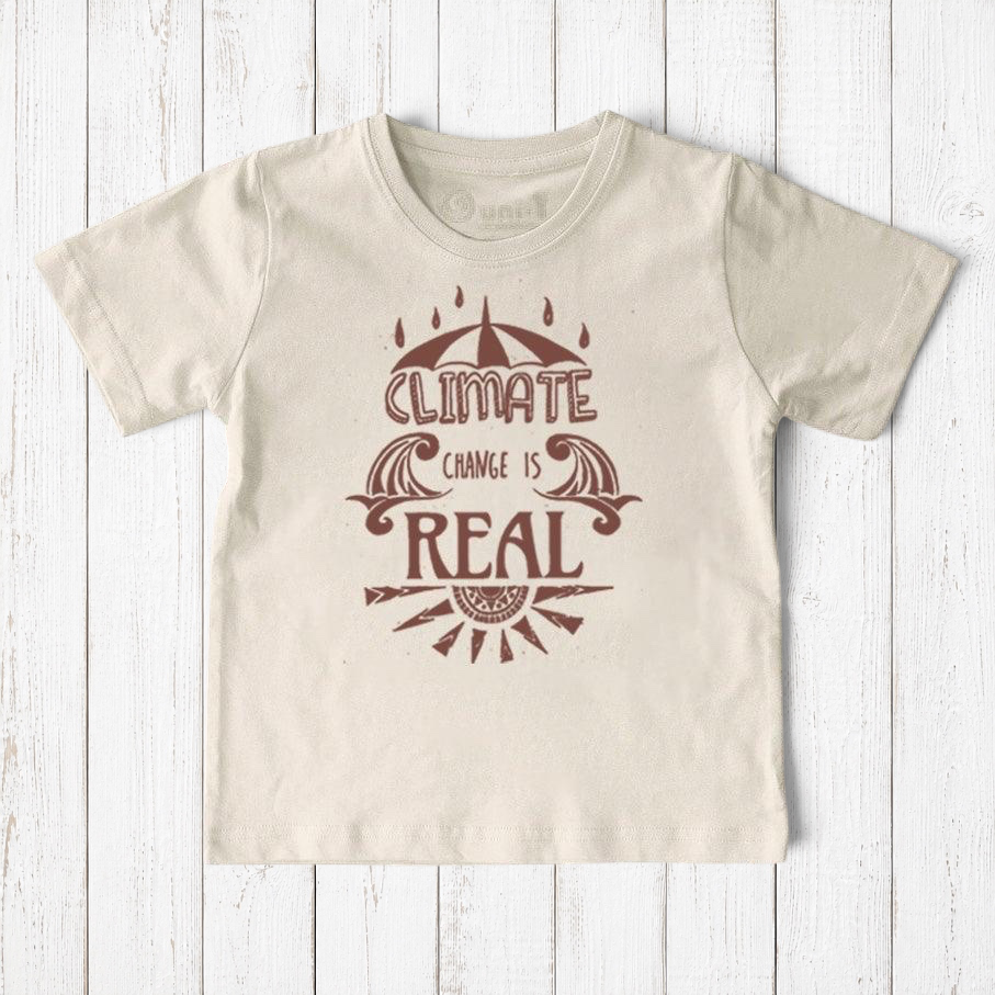Uni-T kids organic cotton t-shirt in cream with brown Climate Change Is Real graphic print on a wooden background