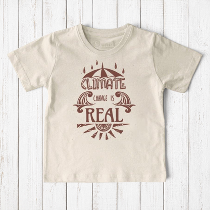 Uni-T kids organic cotton t-shirt in cream with brown Climate Change Is Real graphic print on a wooden background