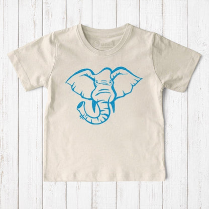 Uni-T kids organic cotton t-shirt in beige featuring a blue hand-illustrated elephant graphic on a white wood background