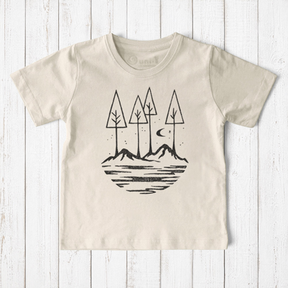 Uni-T kids organic cotton t-shirt in cream featuring a hand-drawn black nature graphic of trees, mountains, and moon.