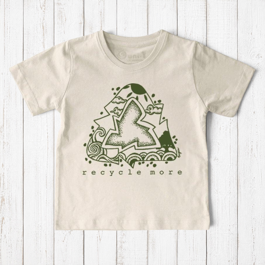 Uni-T kids organic cotton t-shirt in cream with a green hand-illustrated Recycle More graphic on a wood background.