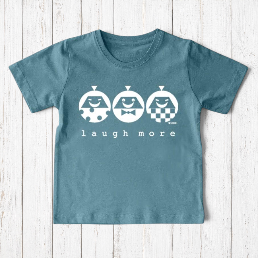 Uni-T kids organic cotton t-shirt in blue with a white Laugh More graphic featuring three playful illustrated faces.